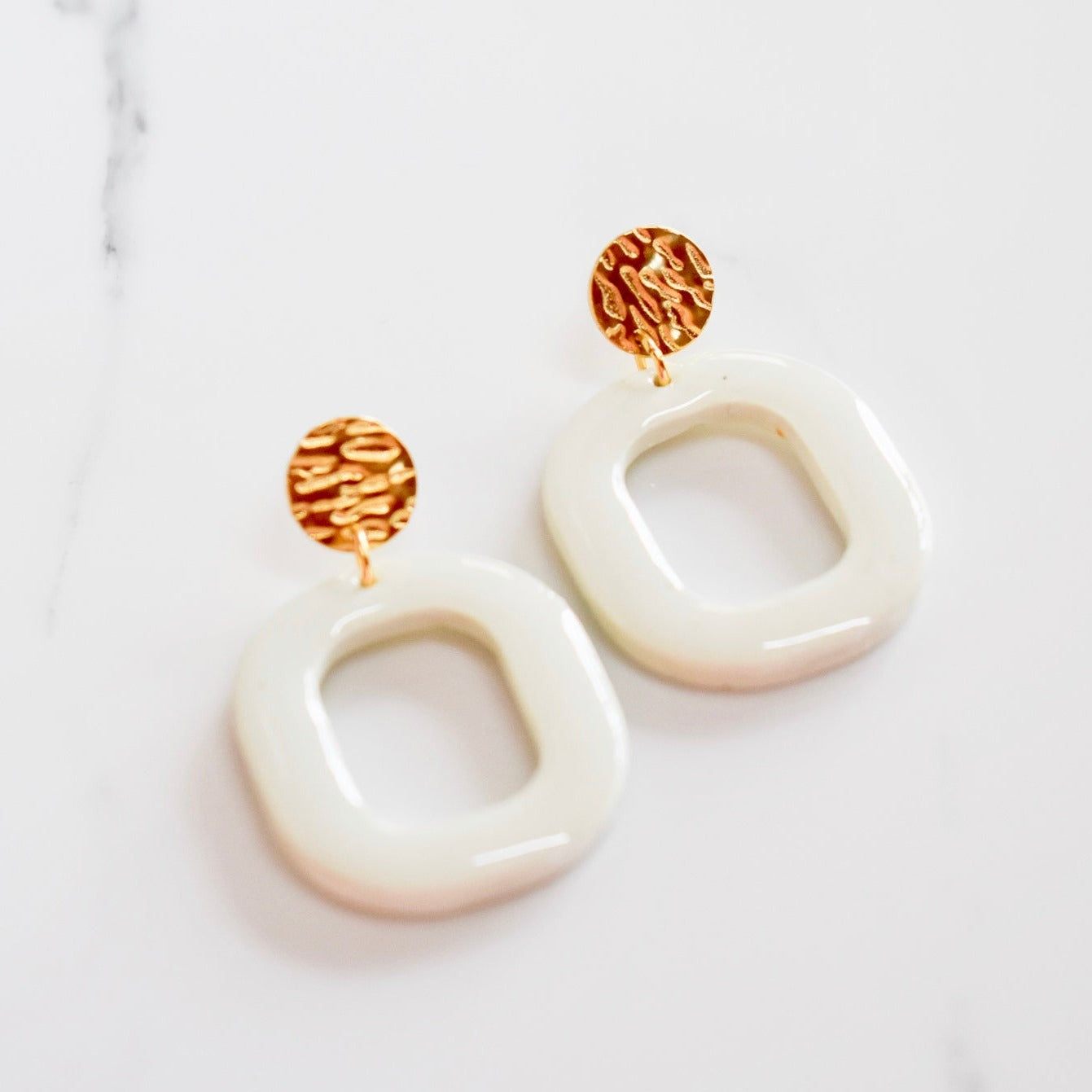 Handmade, light weight and comfortable to wear all day long leather earrings. All our earring hooks are made with a high quality stainless steel and they are hypo allergenic. They will not tarnish or irritate your sensitive skin.