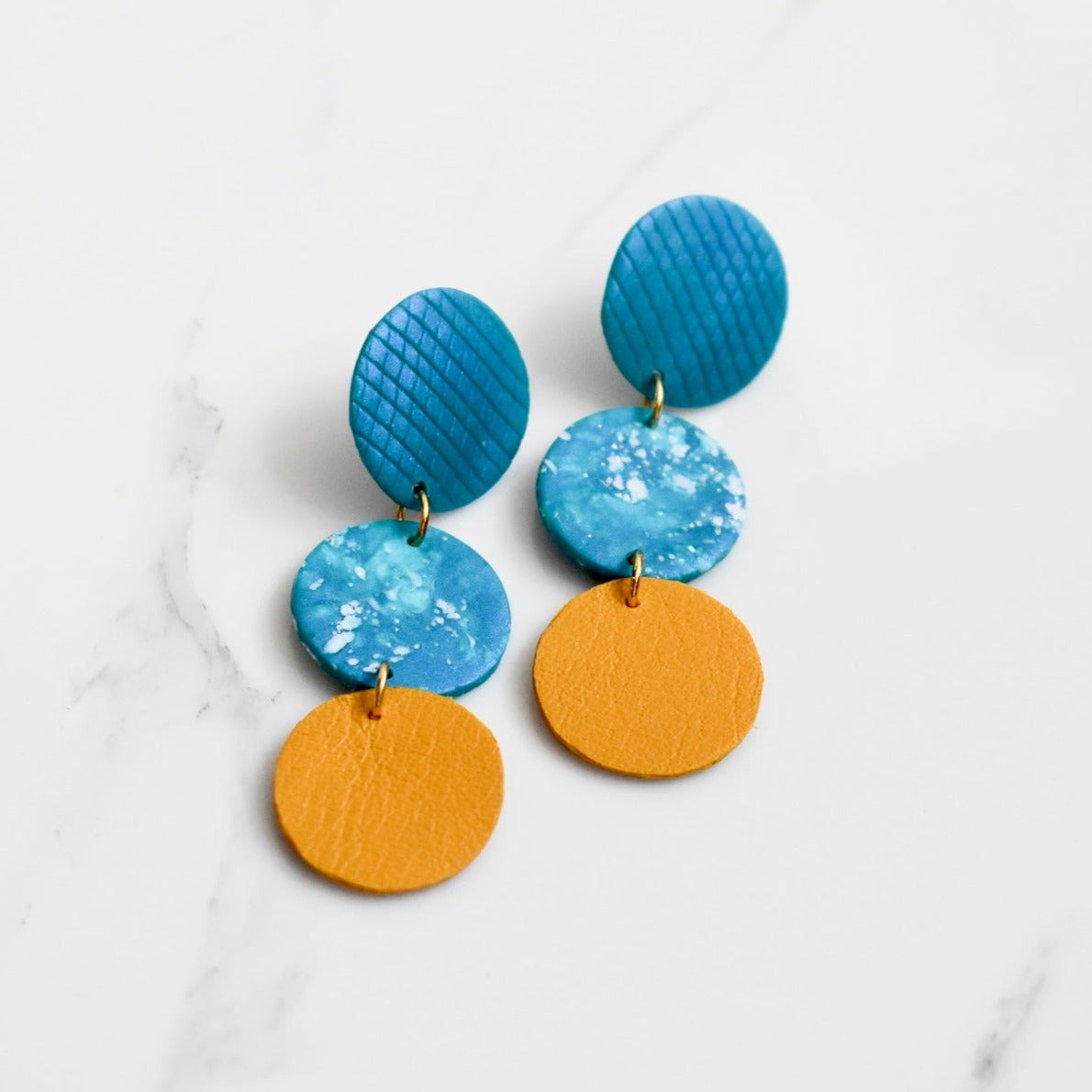 Handmade, light weight and comfortable to wear all day long leather earrings. All our earring hooks are made with a high quality stainless steel and they are hypo allergenic. They will not tarnish or irritate your sensitive skin.