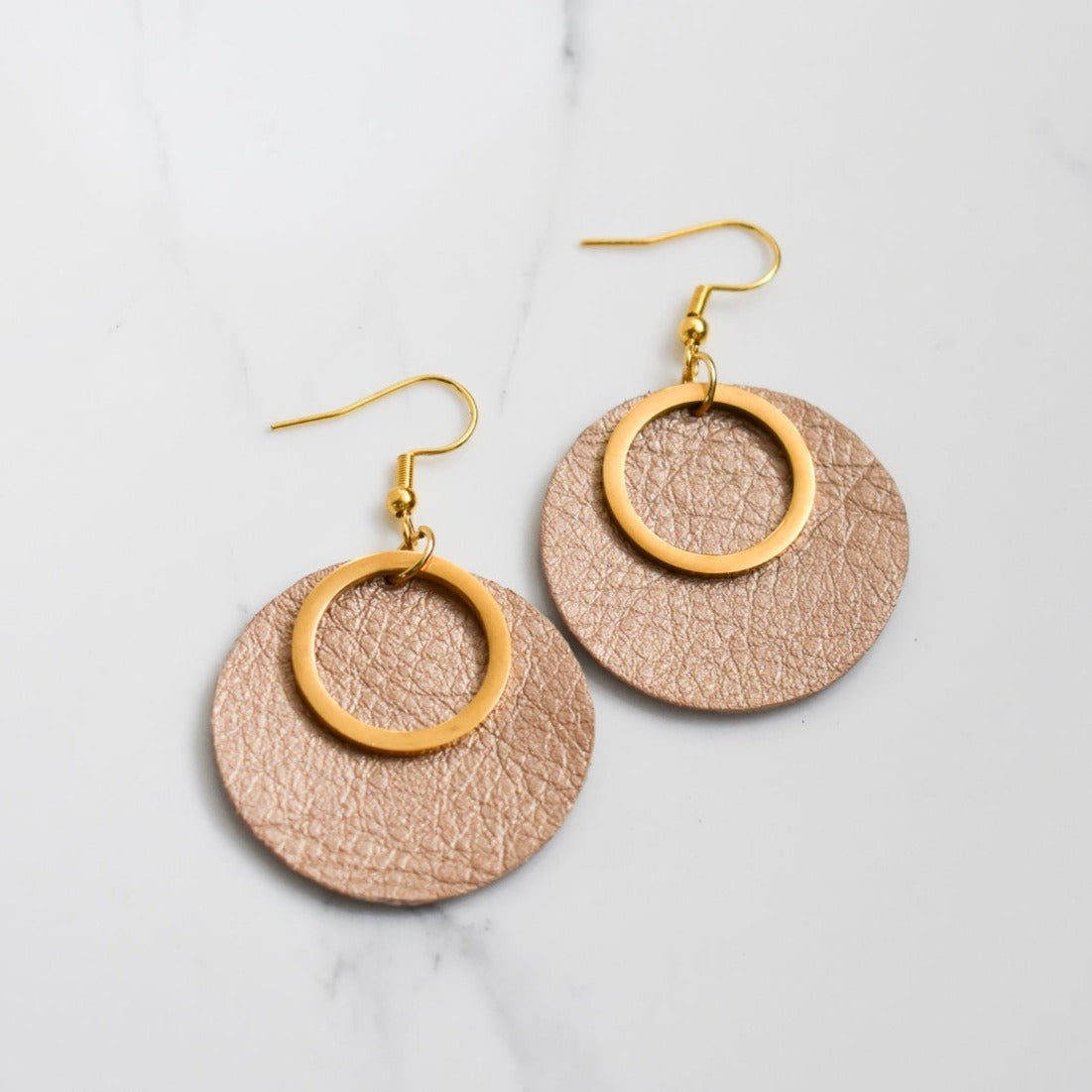 Handmade, light weight and comfortable to wear all day long leather earrings. All our earring hooks are made with a high quality stainless steel and they are hypo allergenic. They will not tarnish or irritate your sensitive skin.