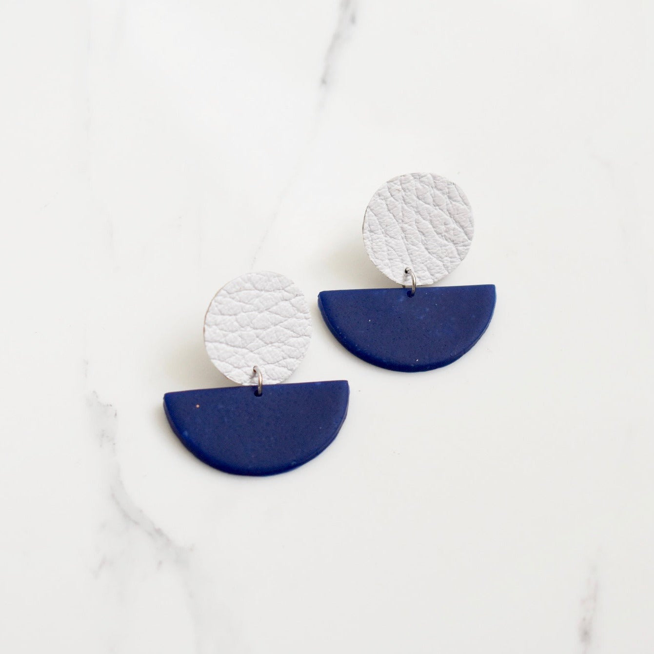 Handmade, light weight and comfortable to wear all day long leather earrings. All our earring hooks are made with a high quality stainless steel and they are hypo allergenic. They will not tarnish or irritate your sensitive skin.