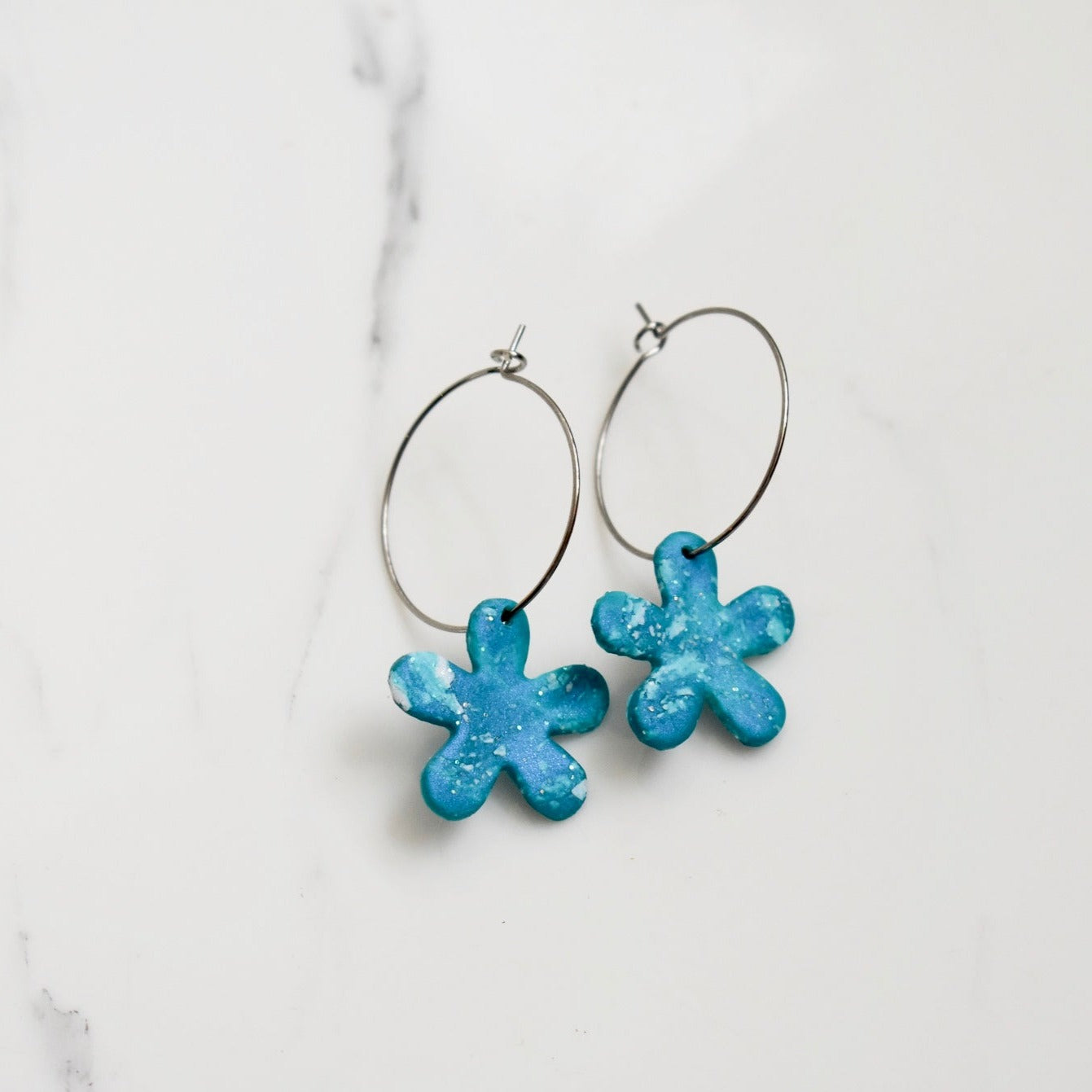 Handmade, light weight and comfortable to wear all day long stainless steel earrings. All our earring hooks are made with a high quality stainless steel and they are hypo allergenic. They will not tarnish or irritate your sensitive skin. They are also WATERPROOF!