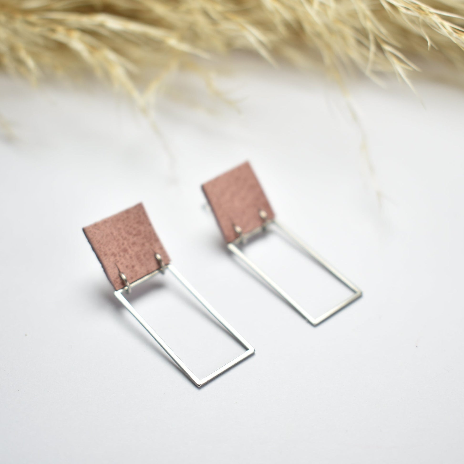 Handmade, light weight and comfortable to wear all day long leather earrings. All our earring hooks are made with a high quality stainless steel and they are hypo allergenic.  They will not tarnish or irritate your sensitive skin.