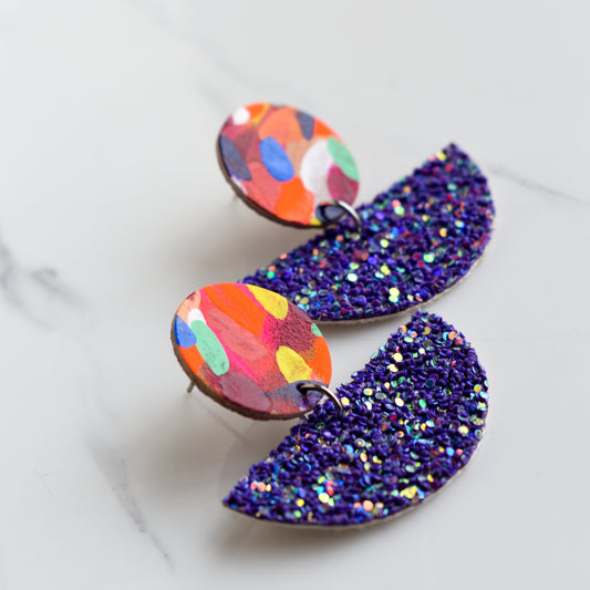 Hand painted and handmade, light weight and comfortable to wear all day long leather earrings. All our earring hooks are made with a high quality stainless steel and they are hypo allergenic. &nbsp;They will not tarnish or irritate your sensitive skin.

