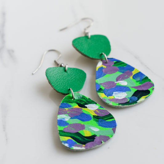 Hand painted and handmade, light weight and comfortable to wear all day long leather earrings. All our earring hooks are made with a high quality stainless steel and they are hypo allergenic. &nbsp;They will not tarnish or irritate your sensitive skin.

