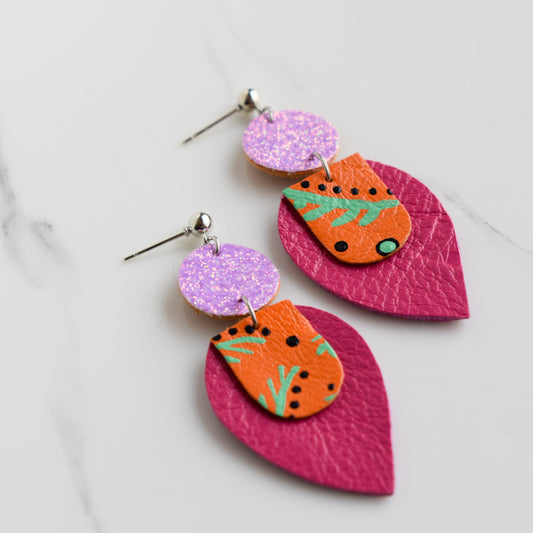 Hand painted and handmade, light weight and comfortable to wear all day long leather earrings. All our earring hooks are made with a high quality stainless steel and they are hypo allergenic. &nbsp;They will not tarnish or irritate your sensitive skin.

