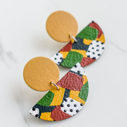 Hand painted and handmade, light weight and comfortable to wear all day long leather earrings. All our earring hooks are made with a high quality stainless steel and they are hypo allergenic. &nbsp;They will not tarnish or irritate your sensitive skin.

