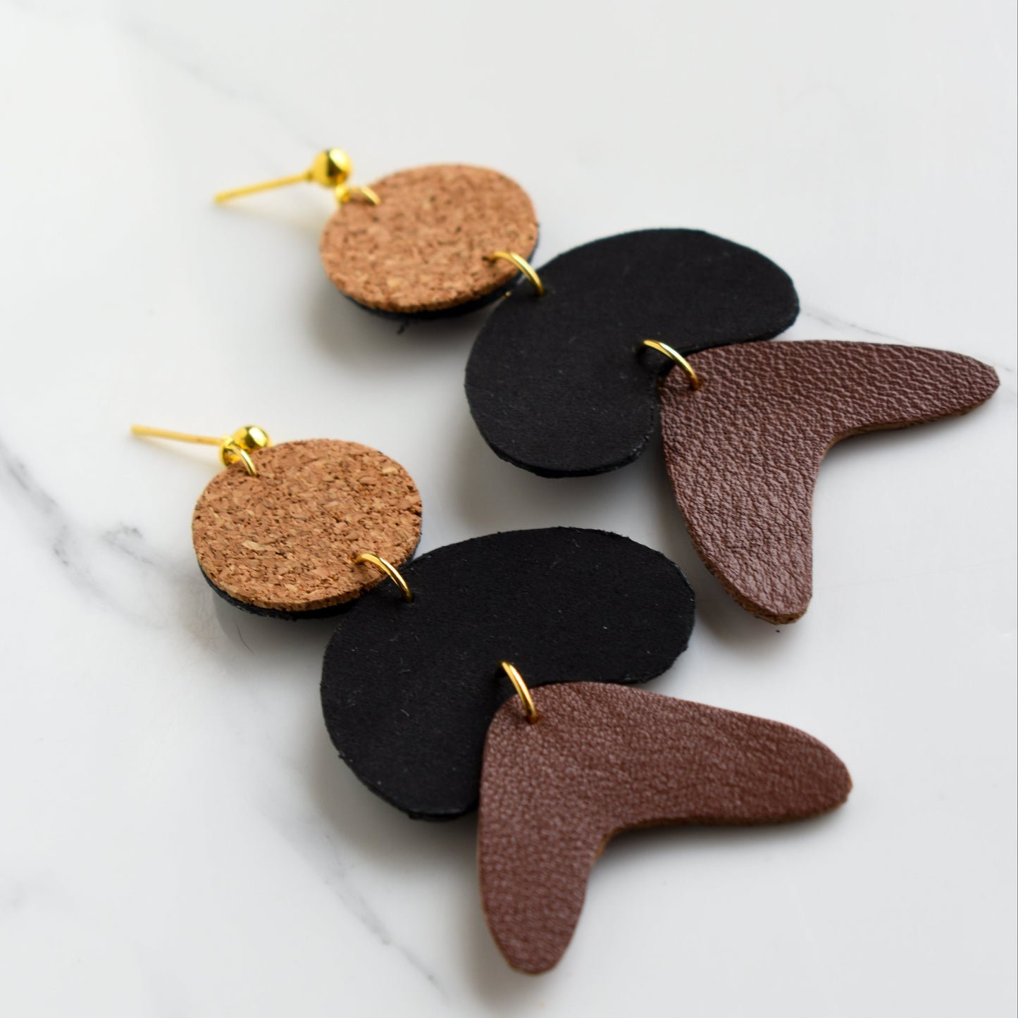 Hand painted and handmade, light weight and comfortable to wear all day long leather earrings. All our earring hooks are made with a high quality stainless steel and they are hypo allergenic. &nbsp;They will not tarnish or irritate your sensitive skin.

