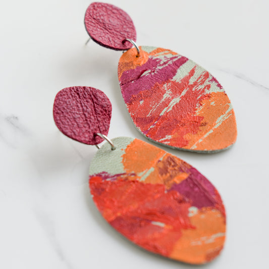 Hand painted and handmade, light weight and comfortable to wear all day long leather earrings. All our earring hooks are made with a high quality stainless steel and they are hypo allergenic. &nbsp;They will not tarnish or irritate your sensitive skin.

