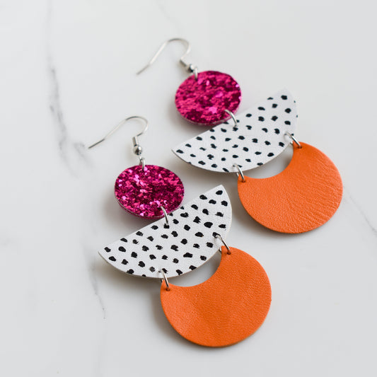 Hand painted and handmade, light weight and comfortable to wear all day long leather earrings. All our earring hooks are made with a high quality stainless steel and they are hypo allergenic. &nbsp;They will not tarnish or irritate your sensitive skin.


