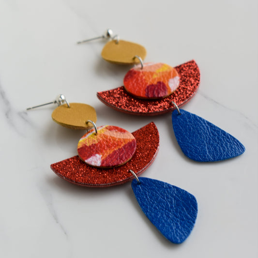 Hand painted and handmade, light weight and comfortable to wear all day long leather earrings. All our earring hooks are made with a high quality stainless steel and they are hypo allergenic. &nbsp;They will not tarnish or irritate your sensitive skin.

