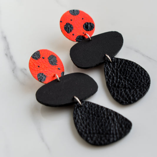 Hand painted and handmade, light weight and comfortable to wear all day long leather earrings. All our earring hooks are made with a high quality stainless steel and they are hypo allergenic. &nbsp;They will not tarnish or irritate your sensitive skin.

