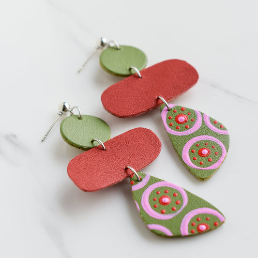 Hand painted and handmade, light weight and comfortable to wear all day long leather earrings. All our earring hooks are made with a high quality stainless steel and they are hypo allergenic. &nbsp;They will not tarnish or irritate your sensitive skin.

