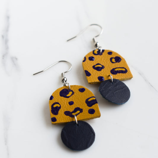 Hand painted and handmade, light weight and comfortable to wear all day long leather earrings. All our earring hooks are made with a high quality stainless steel and they are hypo allergenic. &nbsp;They will not tarnish or irritate your sensitive skin.

