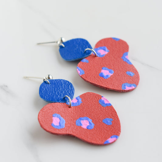 Hand painted and handmade, light weight and comfortable to wear all day long leather earrings. All our earring hooks are made with a high quality stainless steel and they are hypo allergenic. &nbsp;They will not tarnish or irritate your sensitive skin.

