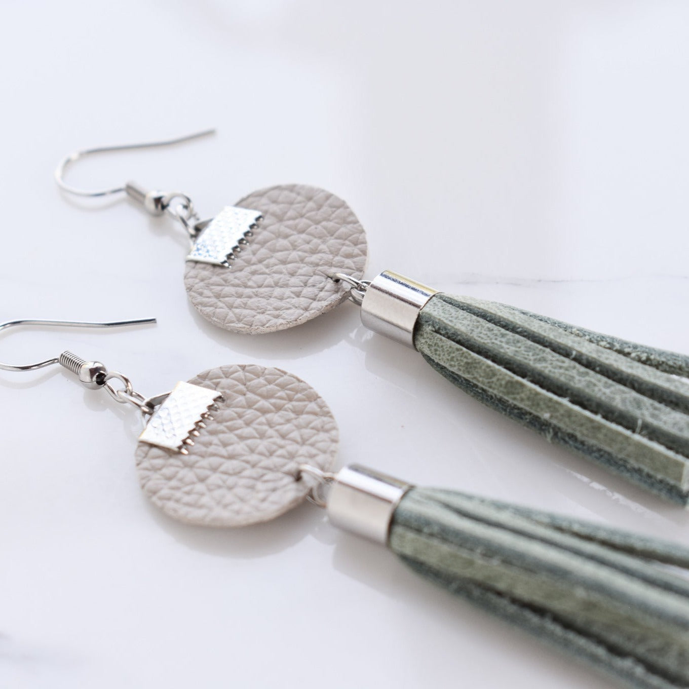 Handmade, light weight and comfortable to wear all day long leather earrings. All our earring hooks are made with a high quality stainless steel and they are hypo allergenic.  They will not tarnish or irritate your sensitive skin.