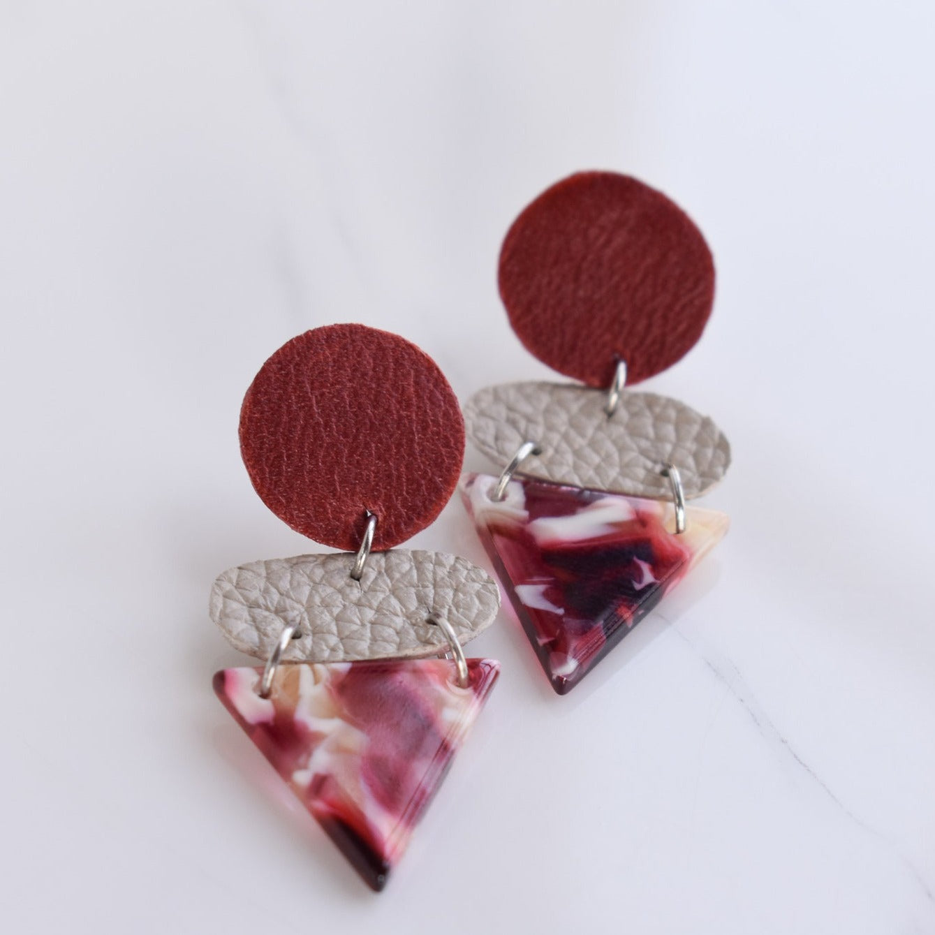 Handmade, light weight and comfortable to wear all day long leather earrings. All our earring hooks are made with a high quality stainless steel and they are hypo allergenic.  They will not tarnish or irritate your sensitive skin.