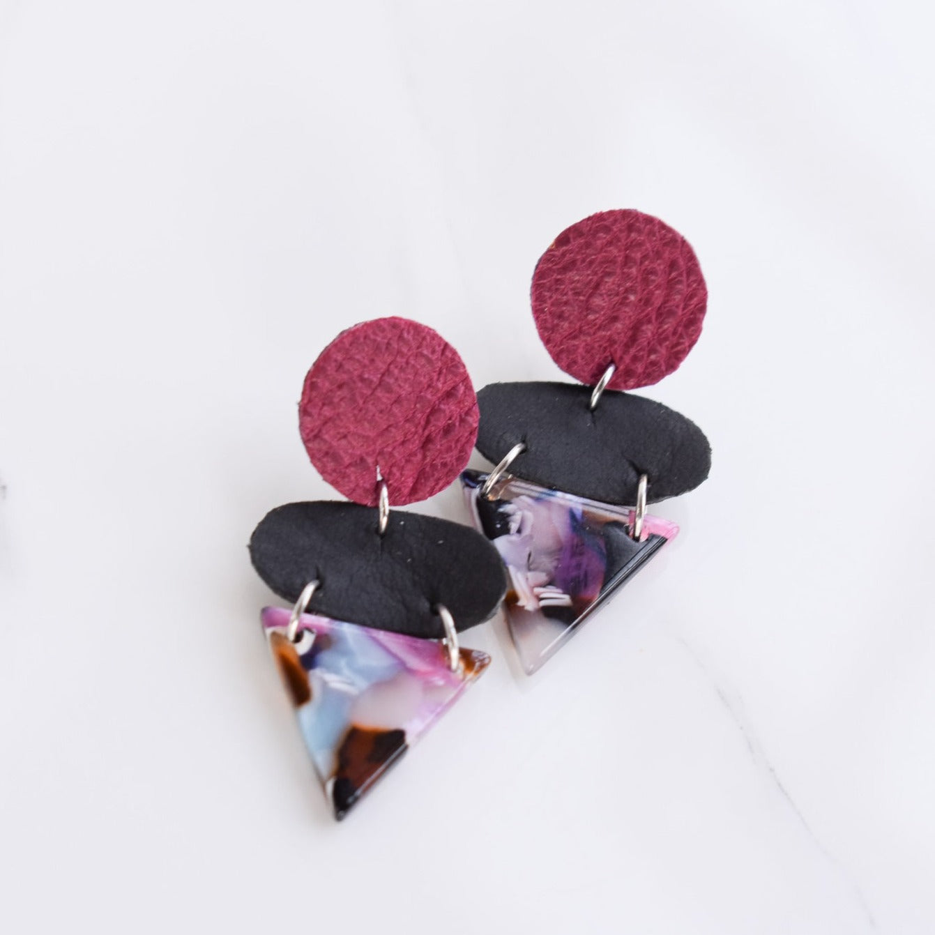 Handmade, light weight and comfortable to wear all day long leather earrings. All our earring hooks are made with a high quality stainless steel and they are hypo allergenic.  They will not tarnish or irritate your sensitive skin.