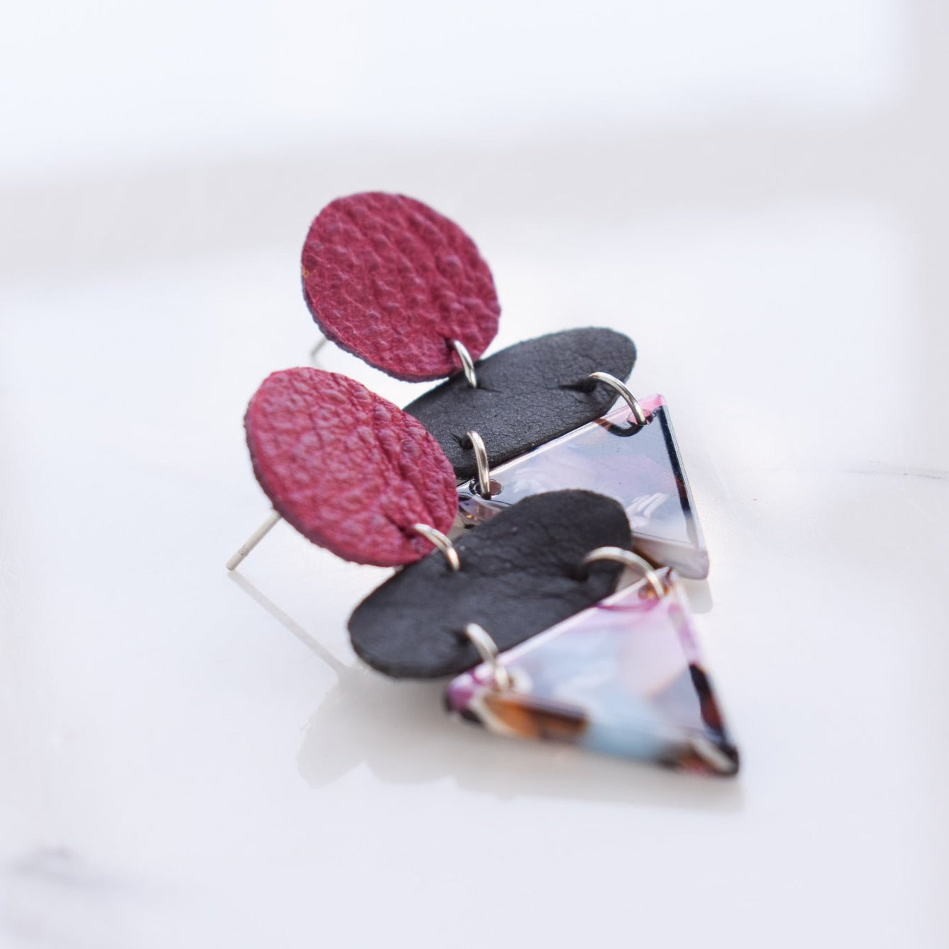 Handmade, light weight and comfortable to wear all day long leather earrings. All our earring hooks are made with a high quality stainless steel and they are hypo allergenic.  They will not tarnish or irritate your sensitive skin.