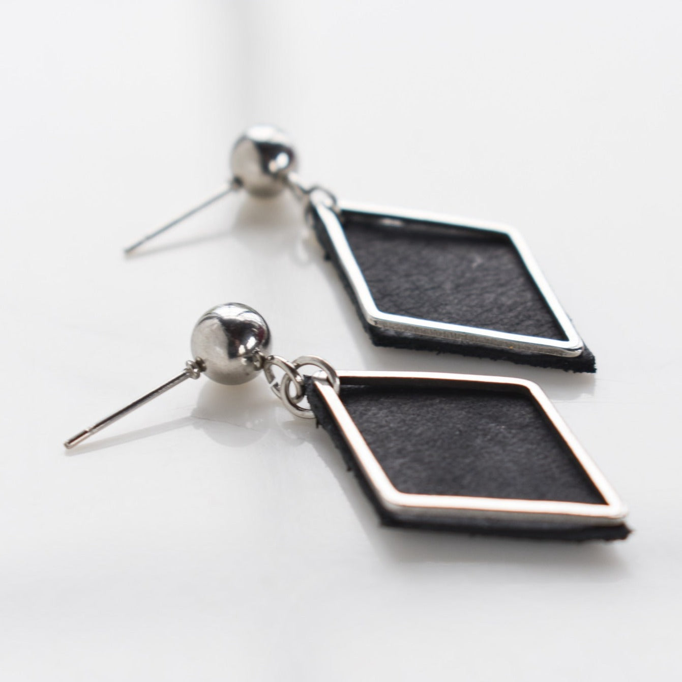 Handmade, light weight and comfortable to wear all day long leather earrings. All our earring hooks are made with a high quality stainless steel and they are hypo allergenic.  They will not tarnish or irritate your sensitive skin.