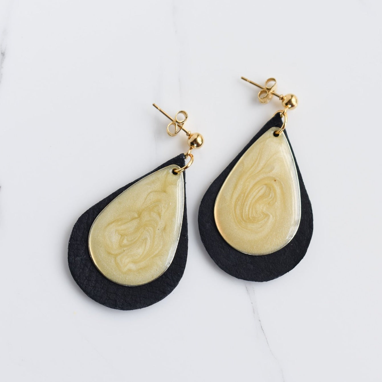 Handmade, light weight and comfortable to wear all day long leather earrings. All our earring hooks are made with a high quality stainless steel and they are hypo allergenic.  They will not tarnish or irritate your sensitive skin.