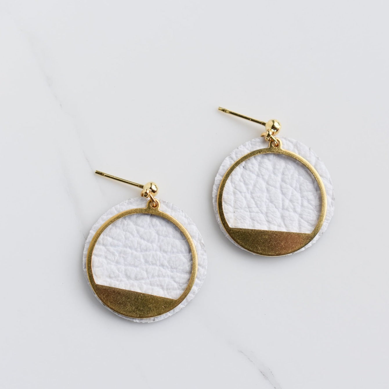 Handmade, light weight and comfortable to wear all day long leather earrings. All our earring hooks are made with a high quality stainless steel and they are hypo allergenic.  They will not tarnish or irritate your sensitive skin.