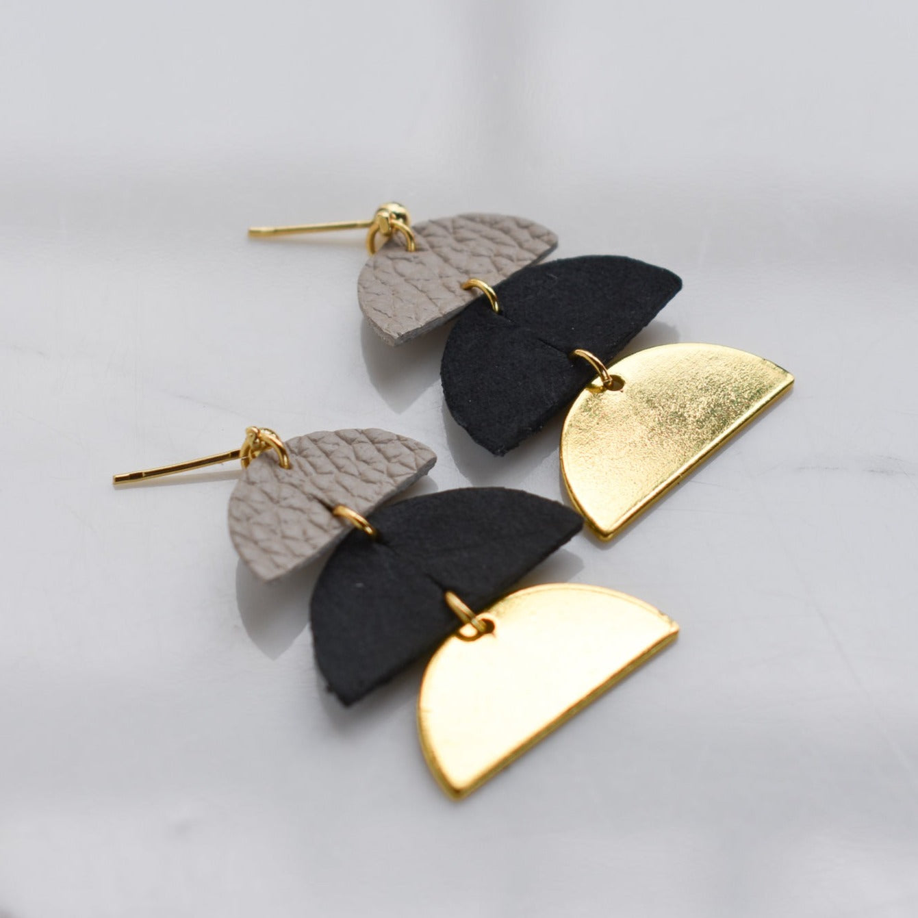 Handmade, light weight and comfortable to wear all day long leather earrings. All our earring hooks are made with a high quality stainless steel and they are hypo allergenic.  They will not tarnish or irritate your sensitive skin.
