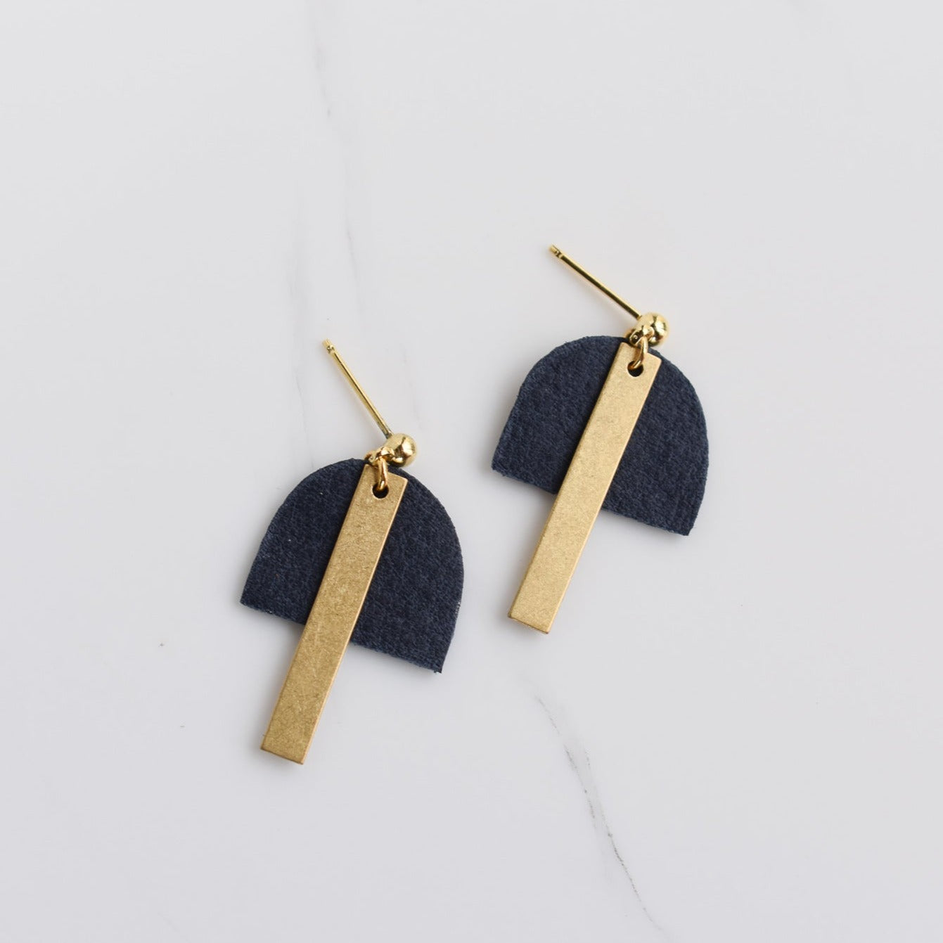 Handmade, light weight and comfortable to wear all day long leather earrings. All our earring hooks are made with a high quality stainless steel and they are hypo allergenic.  They will not tarnish or irritate your sensitive skin.