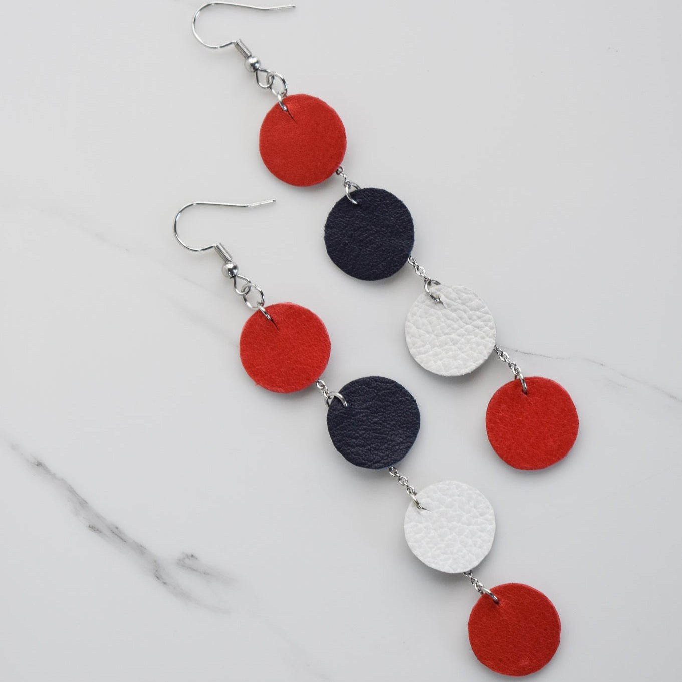 Handmade, light weight and comfortable to wear all day long leather earrings. All our earring hooks are made with a high quality stainless steel and they are hypo allergenic.  They will not tarnish or irritate your sensitive skin.