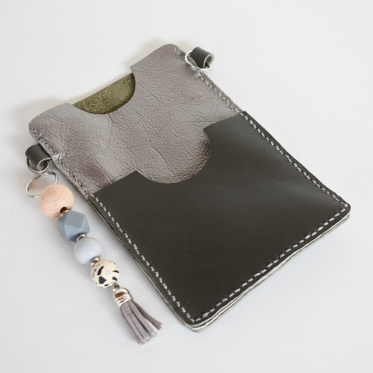 Beautifully handmade and hand stitched leather cellphone sling. Perfect for everyday use. It has a slot for cards and cash. Turn your sling towards your body for extra safety. This also makes an amazing gift and addition to a bridesmaids gift box. YOUR NEW BEST FRIEND - keep your belongings HANDS ON!