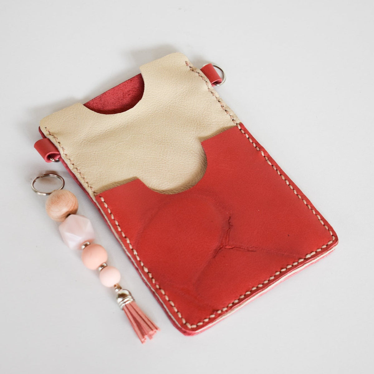 Beautifully handmade and hand stitched leather cellphone sling. Perfect for everyday use. It has a slot for cards and cash. Turn your sling towards your body for extra safety. This also makes an amazing gift and addition to a bridesmaids gift box. YOUR NEW BEST FRIEND - keep your belongings HANDS ON! 