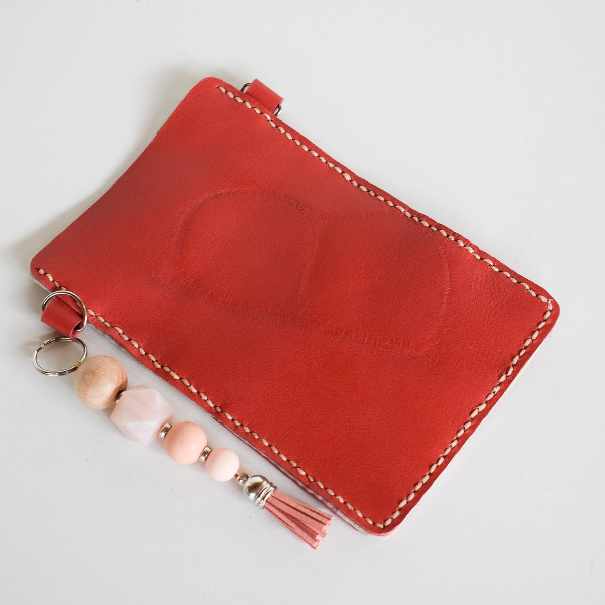 Beautifully handmade and hand stitched leather cellphone sling. Perfect for everyday use. It has a slot for cards and cash. Turn your sling towards your body for extra safety. This also makes an amazing gift and addition to a bridesmaids gift box. YOUR NEW BEST FRIEND - keep your belongings HANDS ON! 