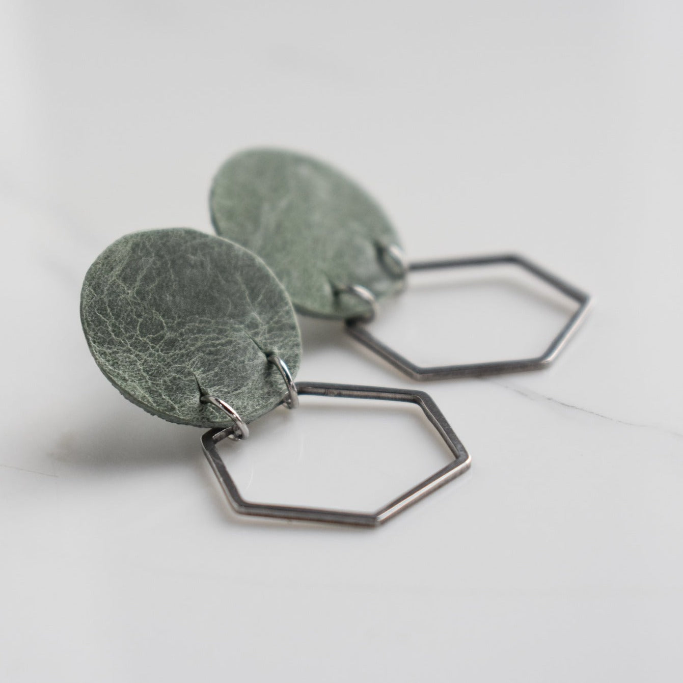 Handmade, light weight and comfortable to wear all day long leather earrings. All our earring hooks are made with a high quality stainless steel and they are hypo allergenic.  They will not tarnish or irritate your sensitive skin.