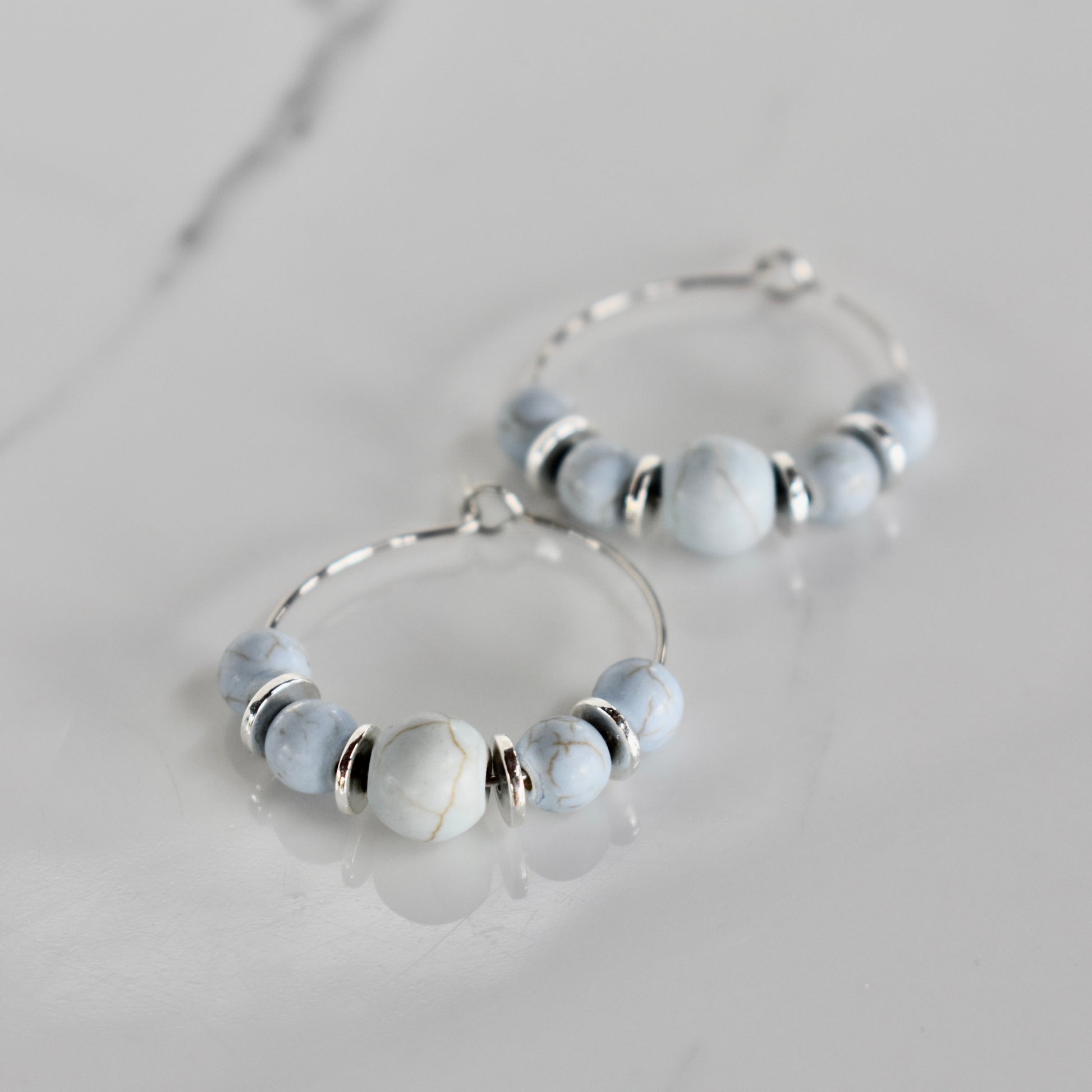 Handmade, light weight and comfortable to wear all day long earrings with beads. Available in silver. All our earring hooks are made with a high quality stainless steel and they are hypo allergenic.  They will not tarnish or irritate your sensitive skin.