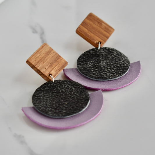 Handmade, light weight and comfortable to wear all day long solid wood (Kiaat) and leather earrings. Available in silver or gold. All our earring hooks are made with a high quality stainless steel and they are hypo allergenic.  They will not tarnish or irritate your sensitive skin.