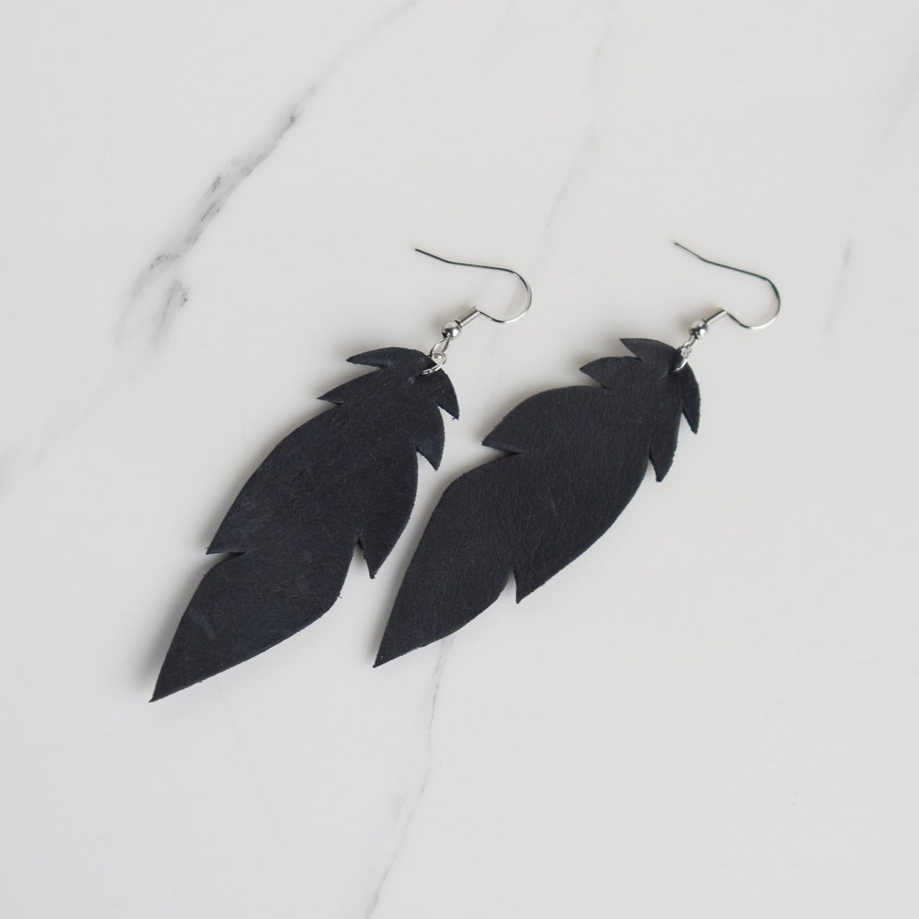 Handmade, light weight and comfortable to wear all day long leather earrings. All our earring hooks are made with a high quality stainless steel and they are hypo allergenic.  They will not tarnish or irritate your sensitive skin.