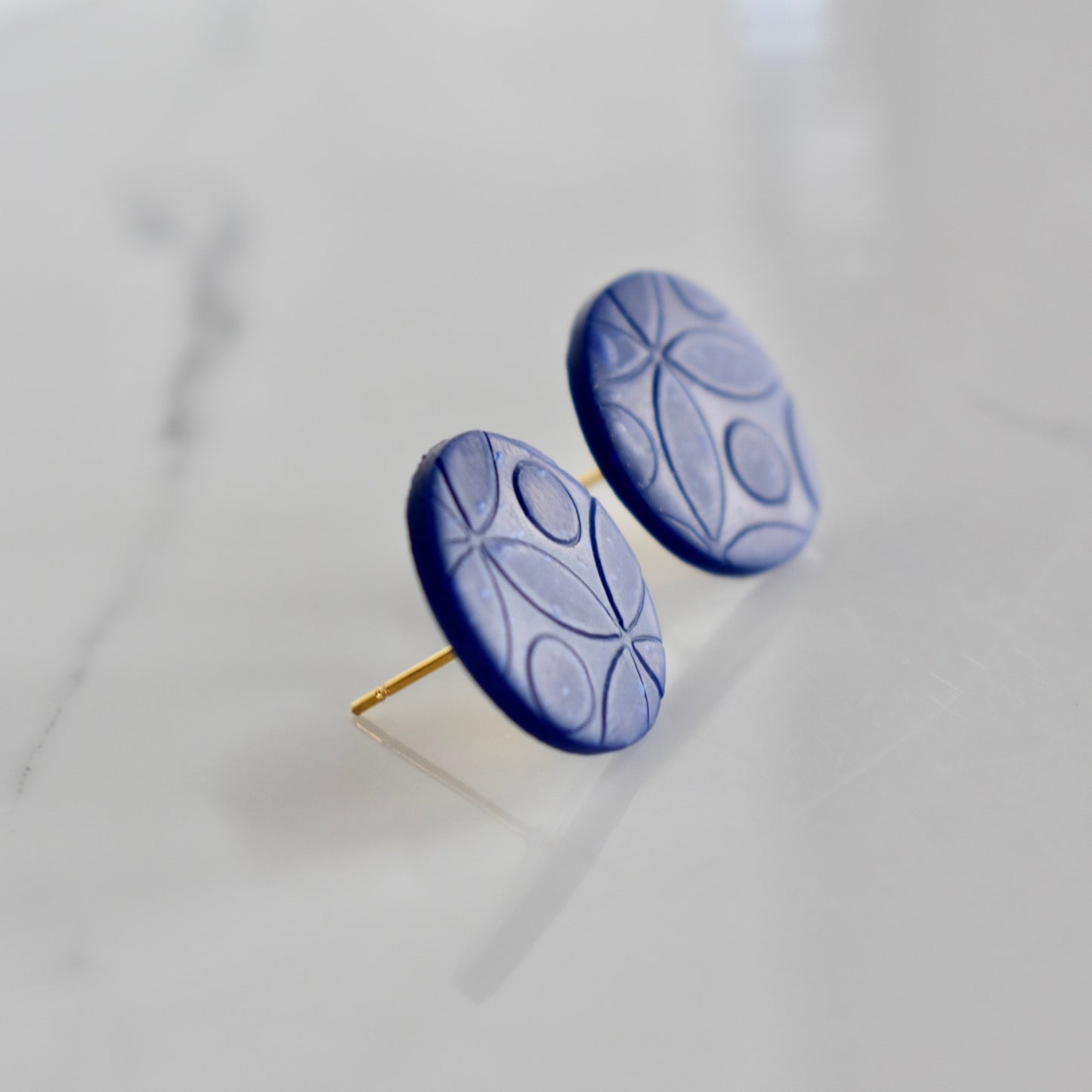 Handmade, light weight and comfortable to wear all day long clay studs earrings. Available in silver or gold. All our earring hooks are made with a high quality stainless steel and they are hypo allergenic.  They will not tarnish or irritate your sensitive skin.