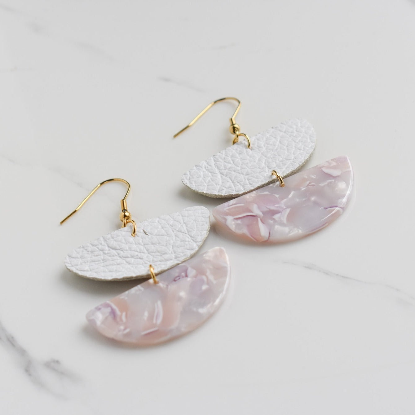 Handmade, light weight and comfortable to wear all day long leather earrings. All our earring hooks are made with a high quality stainless steel and they are hypo allergenic.  They will not tarnish or irritate your sensitive skin.