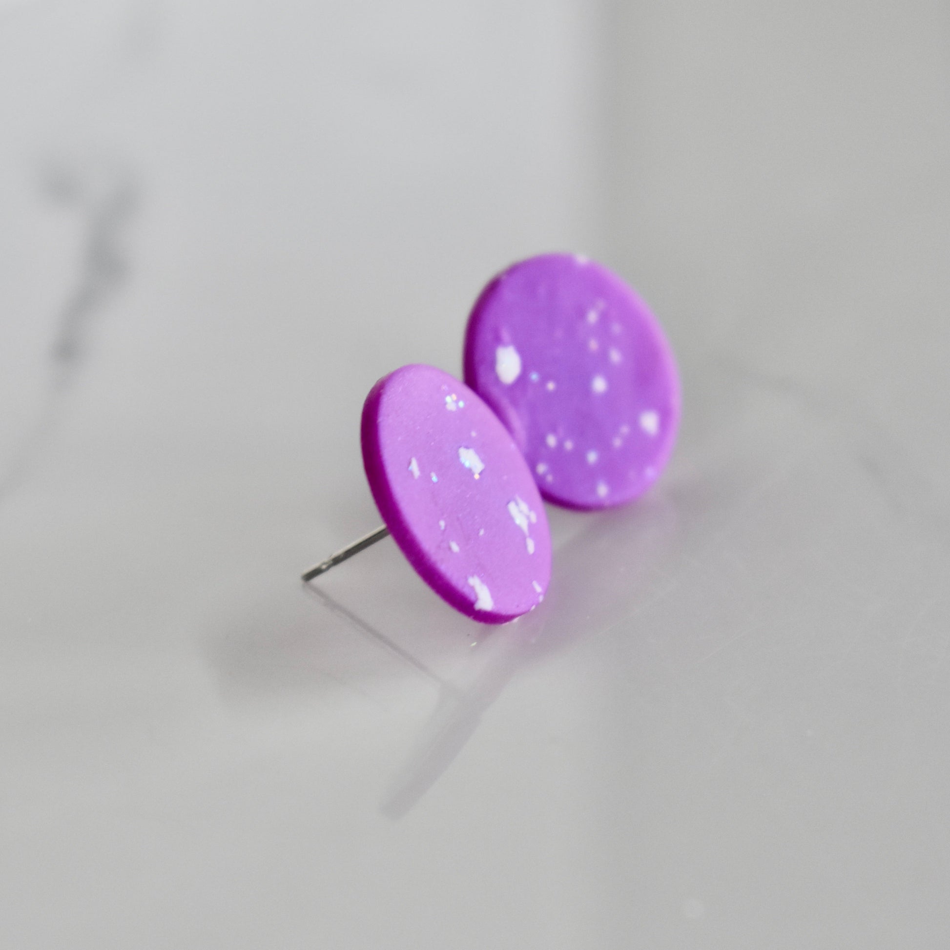 Handmade, light weight and comfortable to wear all day long clay studs earrings. Available in silver or gold. All our earring hooks are made with a high quality stainless steel and they are hypo allergenic.  They will not tarnish or irritate your sensitive skin.