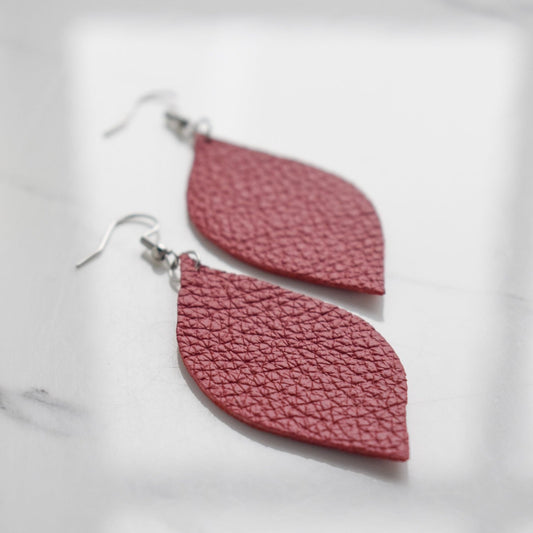 Handmade, light weight and comfortable to wear all day long leather earrings. All our earring hooks are made with a high quality stainless steel and they are hypo allergenic.  They will not tarnish or irritate your sensitive skin.