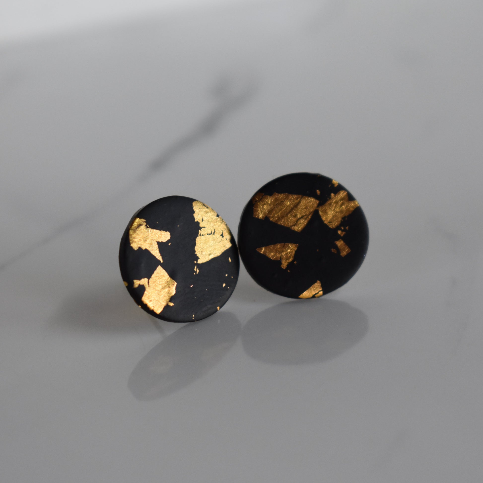 Handmade, light weight and comfortable to wear all day long clay studs earrings. Available in silver or gold. All our earring hooks are made with a high quality stainless steel and they are hypo allergenic.  They will not tarnish or irritate your sensitive skin.