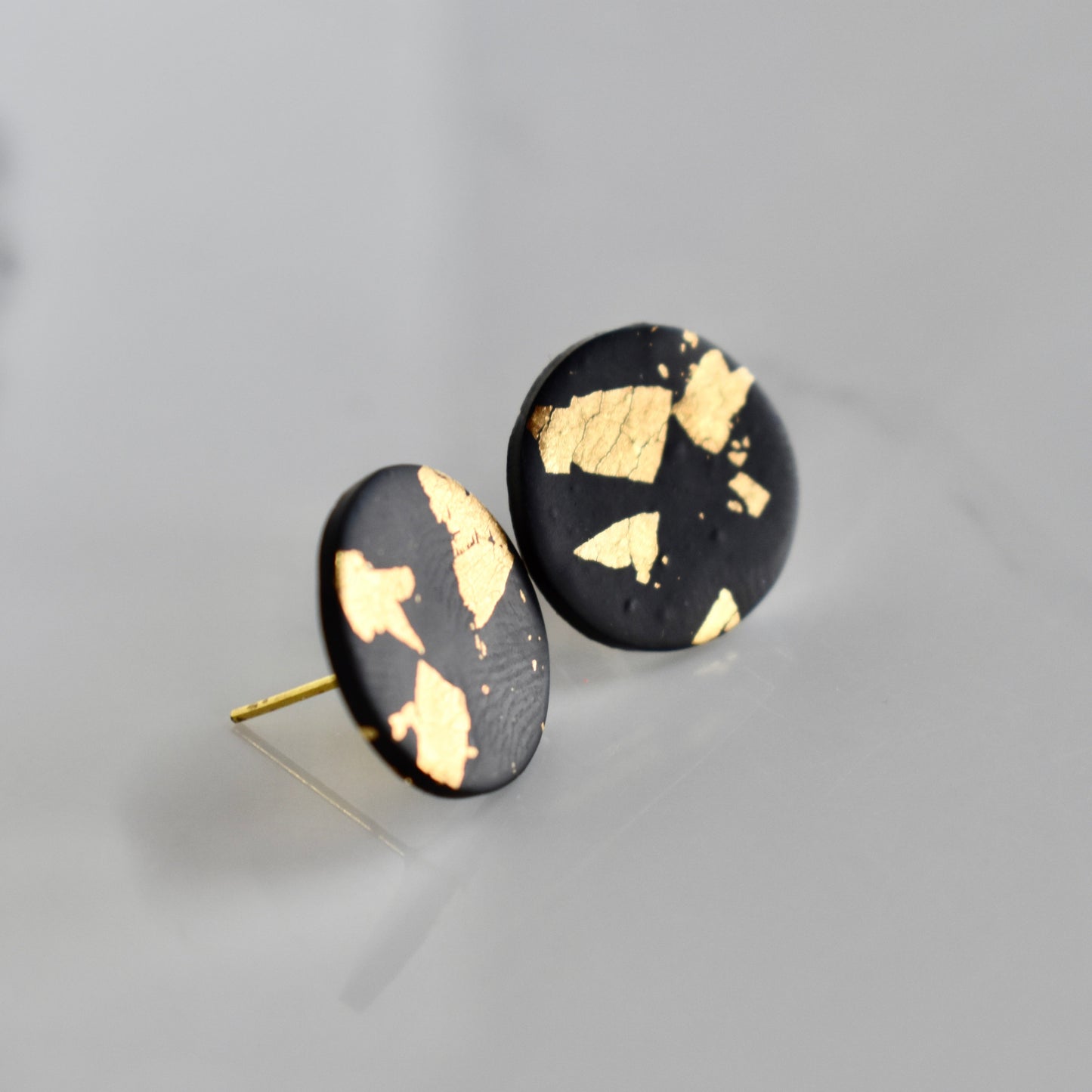 Handmade, light weight and comfortable to wear all day long clay studs earrings. Available in silver or gold. All our earring hooks are made with a high quality stainless steel and they are hypo allergenic.  They will not tarnish or irritate your sensitive skin.