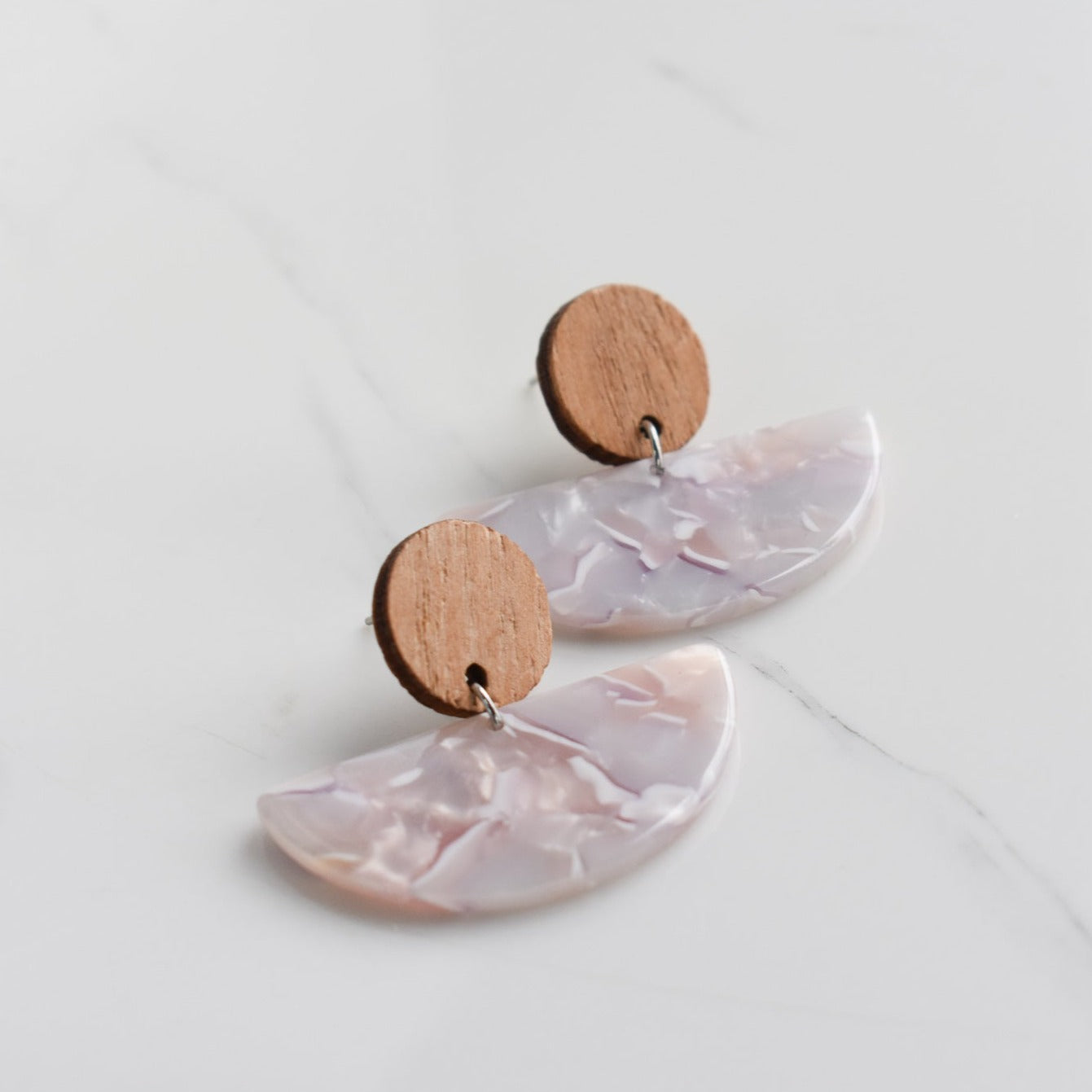 Handmade, light weight and comfortable to wear all day long leather earrings. All our earring hooks are made with a high quality stainless steel and they are hypo allergenic.  They will not tarnish or irritate your sensitive skin.
