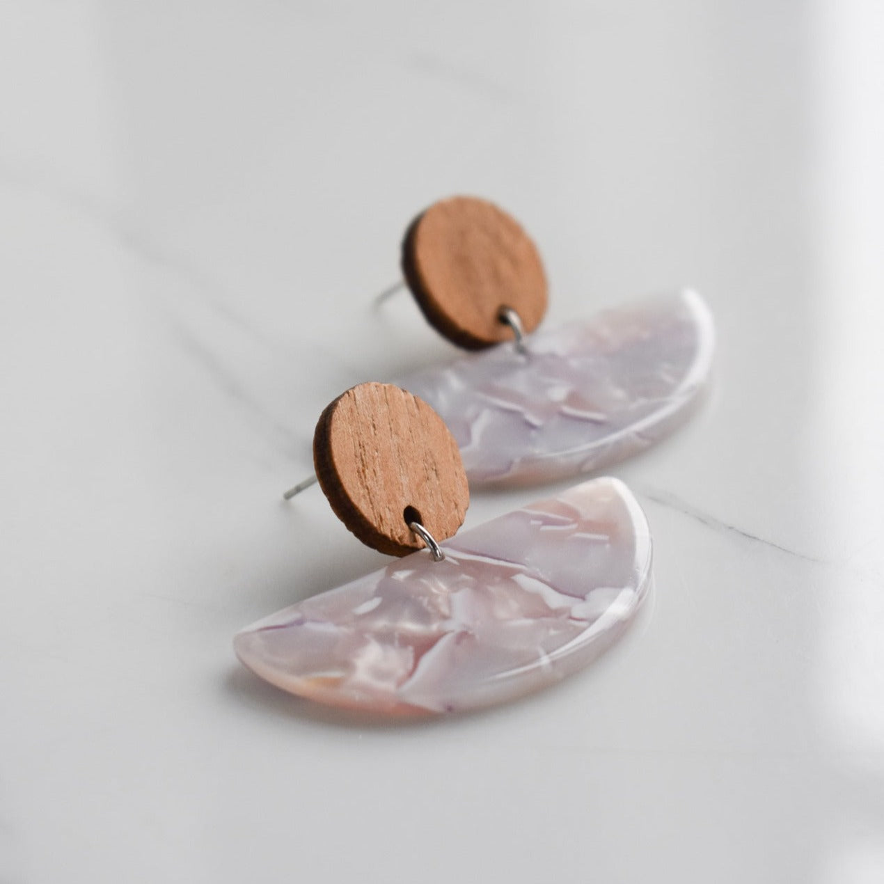 Handmade, light weight and comfortable to wear all day long leather earrings. All our earring hooks are made with a high quality stainless steel and they are hypo allergenic.  They will not tarnish or irritate your sensitive skin.