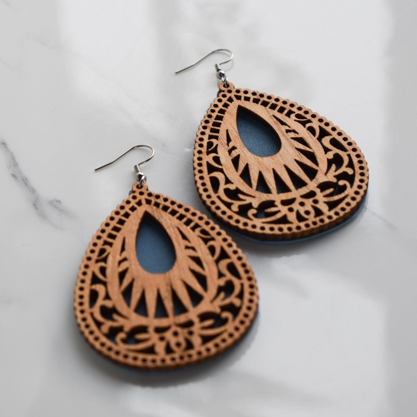 Handmade, light weight and comfortable to wear all day long leather earrings. All our earring hooks are made with a high quality stainless steel and they are hypo allergenic.  They will not tarnish or irritate your sensitive skin.