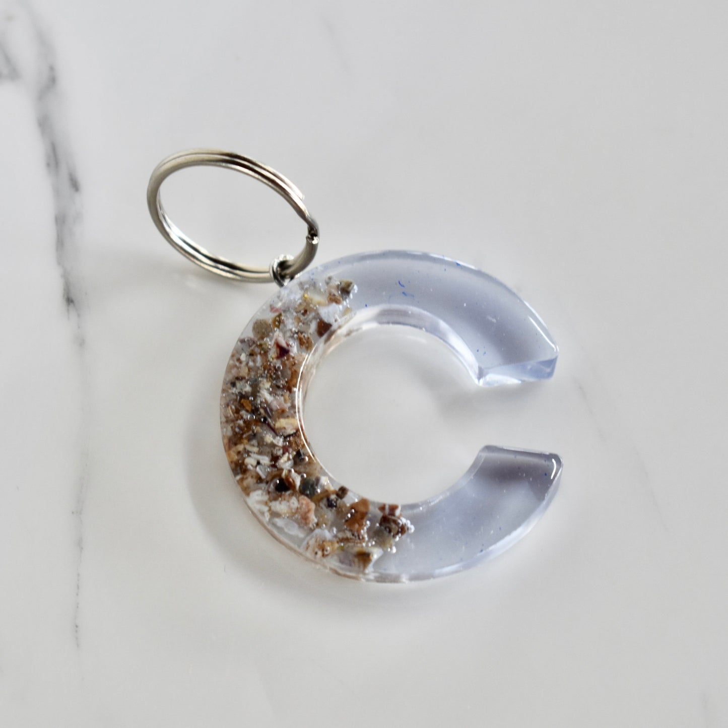 Beautifully hand made resin keychain. A perfect addition to a gift or a great thank you gift for a wedding. 