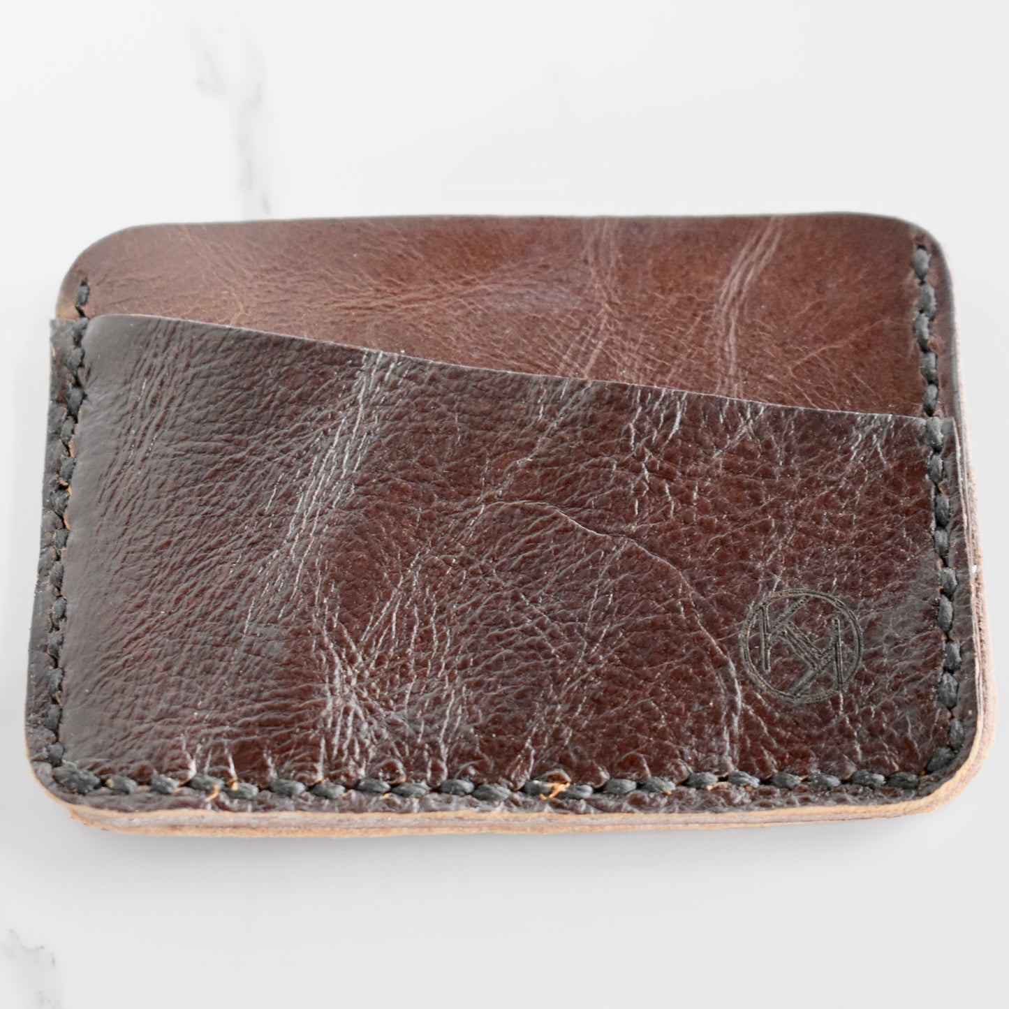 Beautifully hand made genuine leather card holder. Perfect gift idea for a man or women - it can store up to 6 cards.