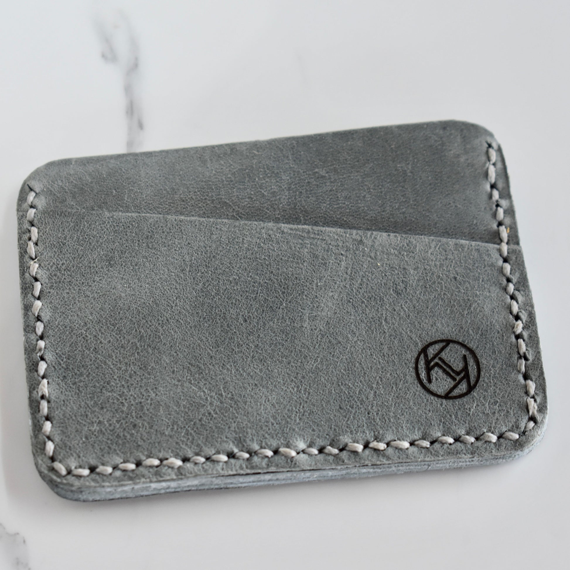 Beautifully hand made genuine leather card holder. Perfect gift idea for a man or women - it can store up to 6 cards.