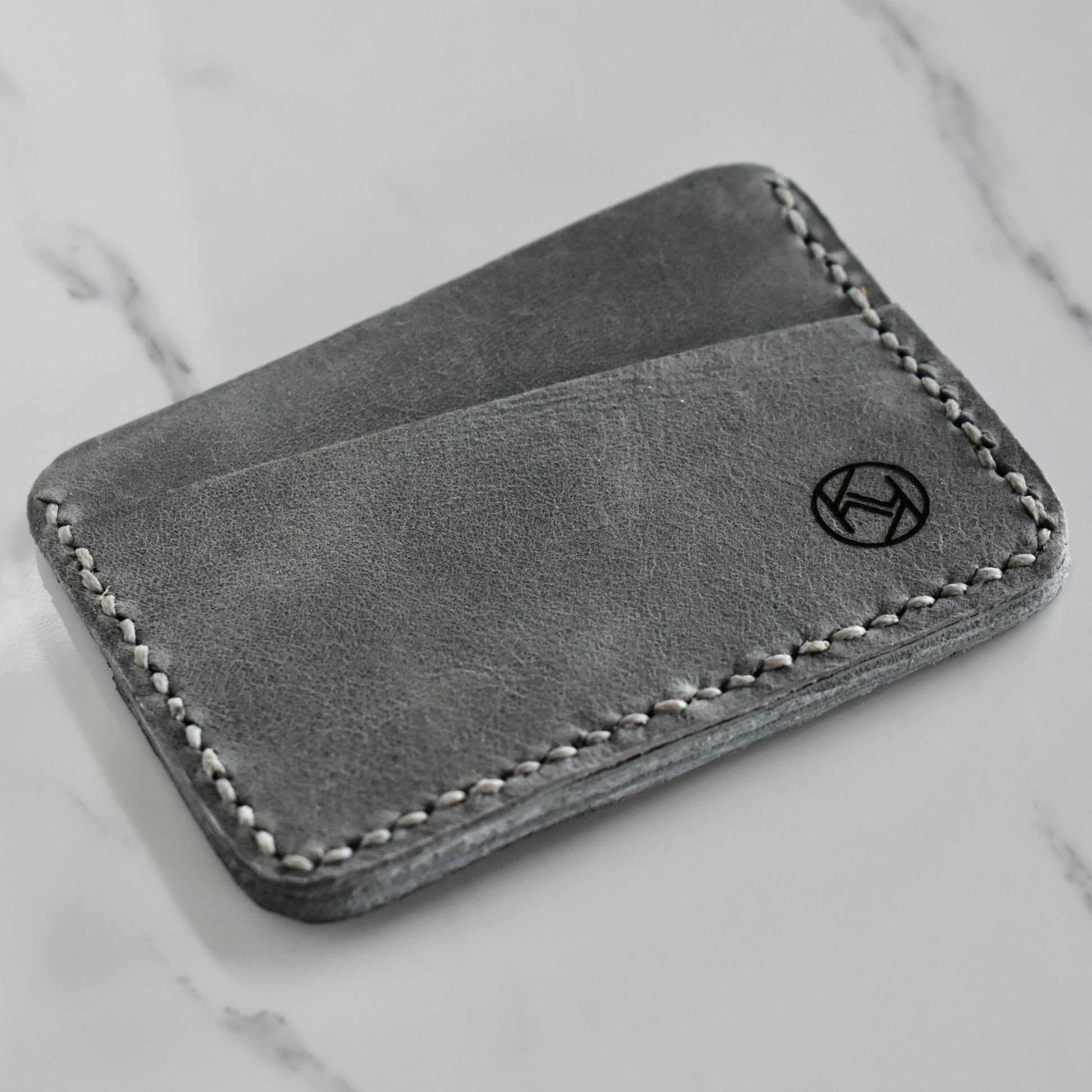 Beautifully hand made genuine leather card holder. Perfect gift idea for a man or women - it can store up to 6 cards.