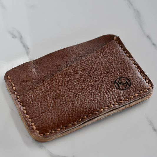 Beautifully hand made genuine leather card holder. Perfect gift idea for a man or women - it can store up to 6 cards.