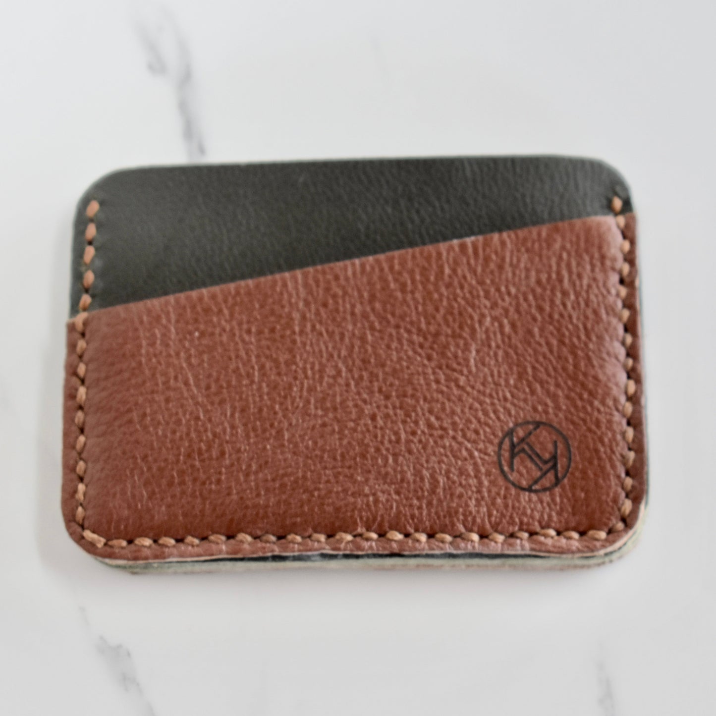 Beautifully hand made genuine leather card holder. Perfect gift idea for a man or women - it can store up to 6 cards.